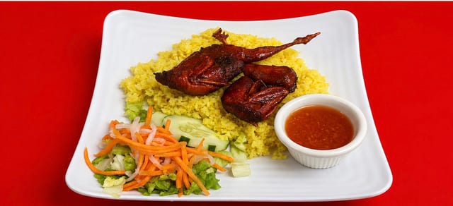 Roast Quail Yellow Rice.